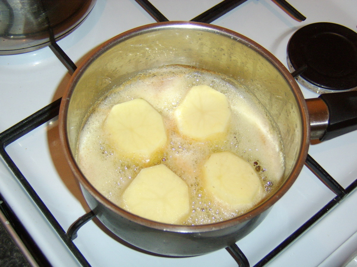 When cooking fondant potatoes, the potato barrels are added to melted butter.