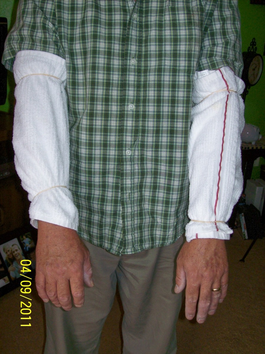 My wife suggested that I wrap dish towels around my arms to protect them from the rough environment and the sun.