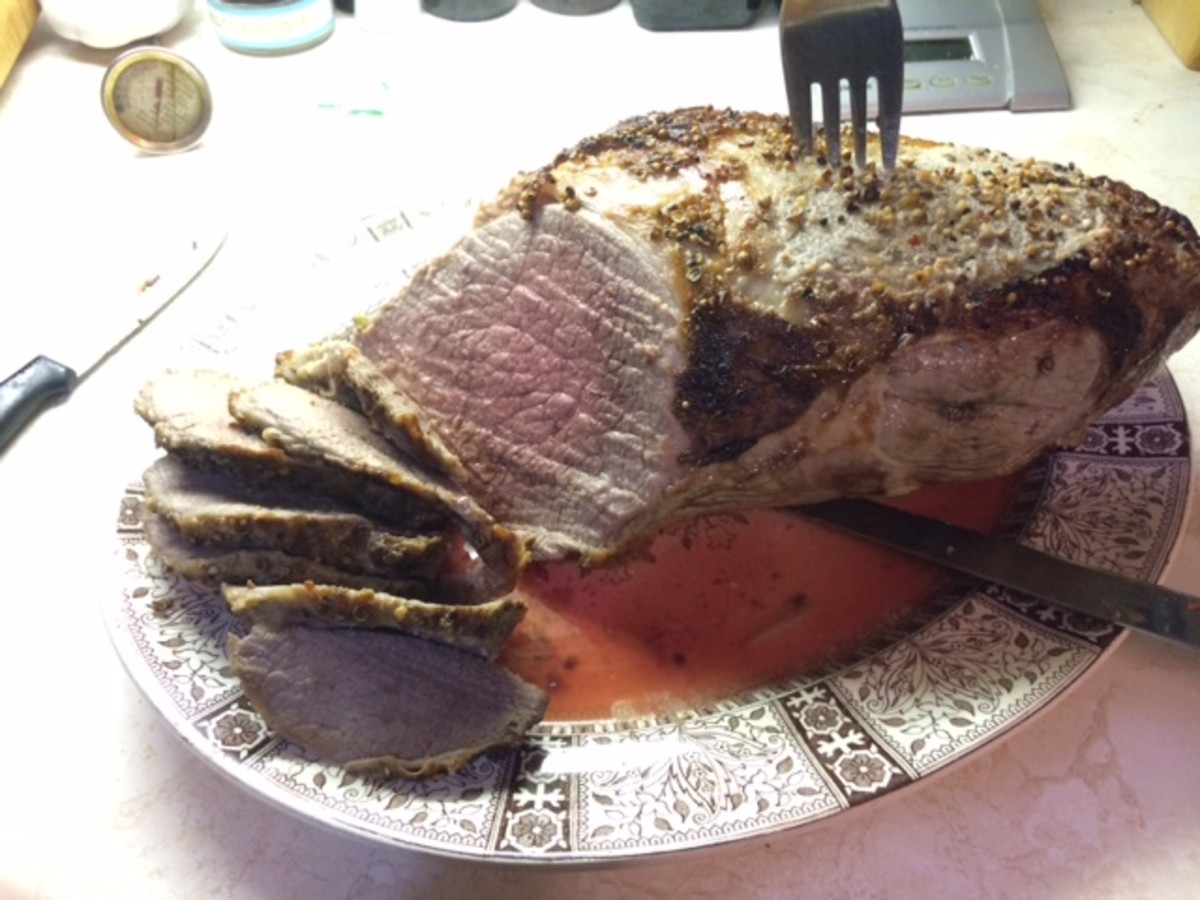 Roast beef is rare in the middle and medium on the ends