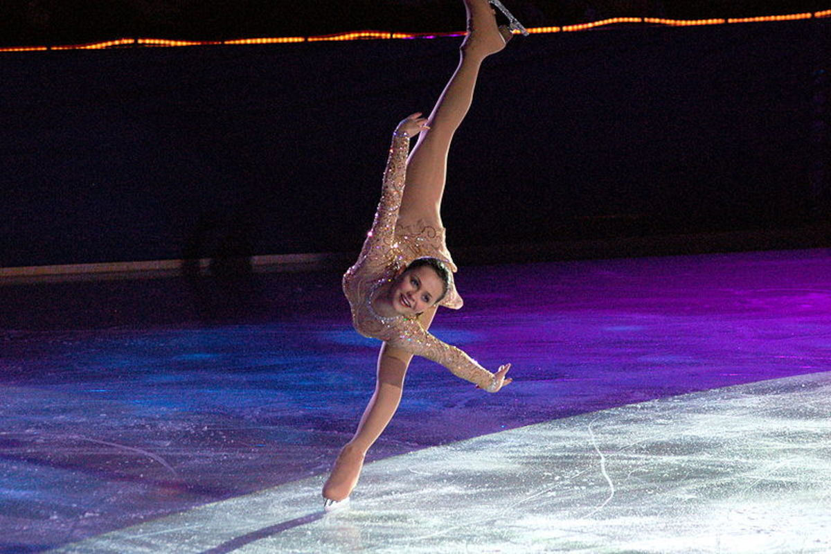 Okay, this is not a beginner move but is highly inspiring and simply beautiful. Sasha Cohen performing her distinctive spiral.