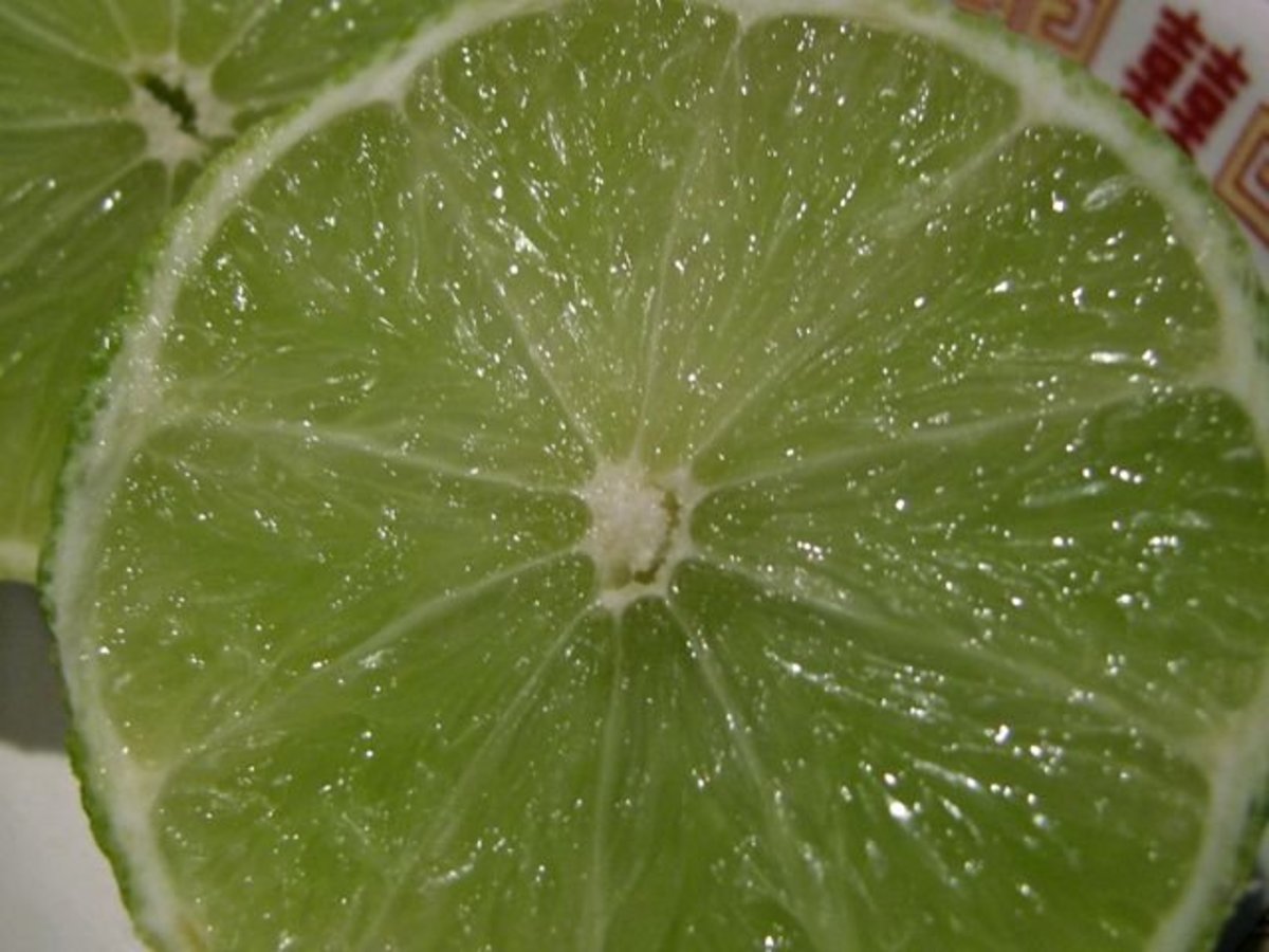Cut limes, ready to be squeezed.