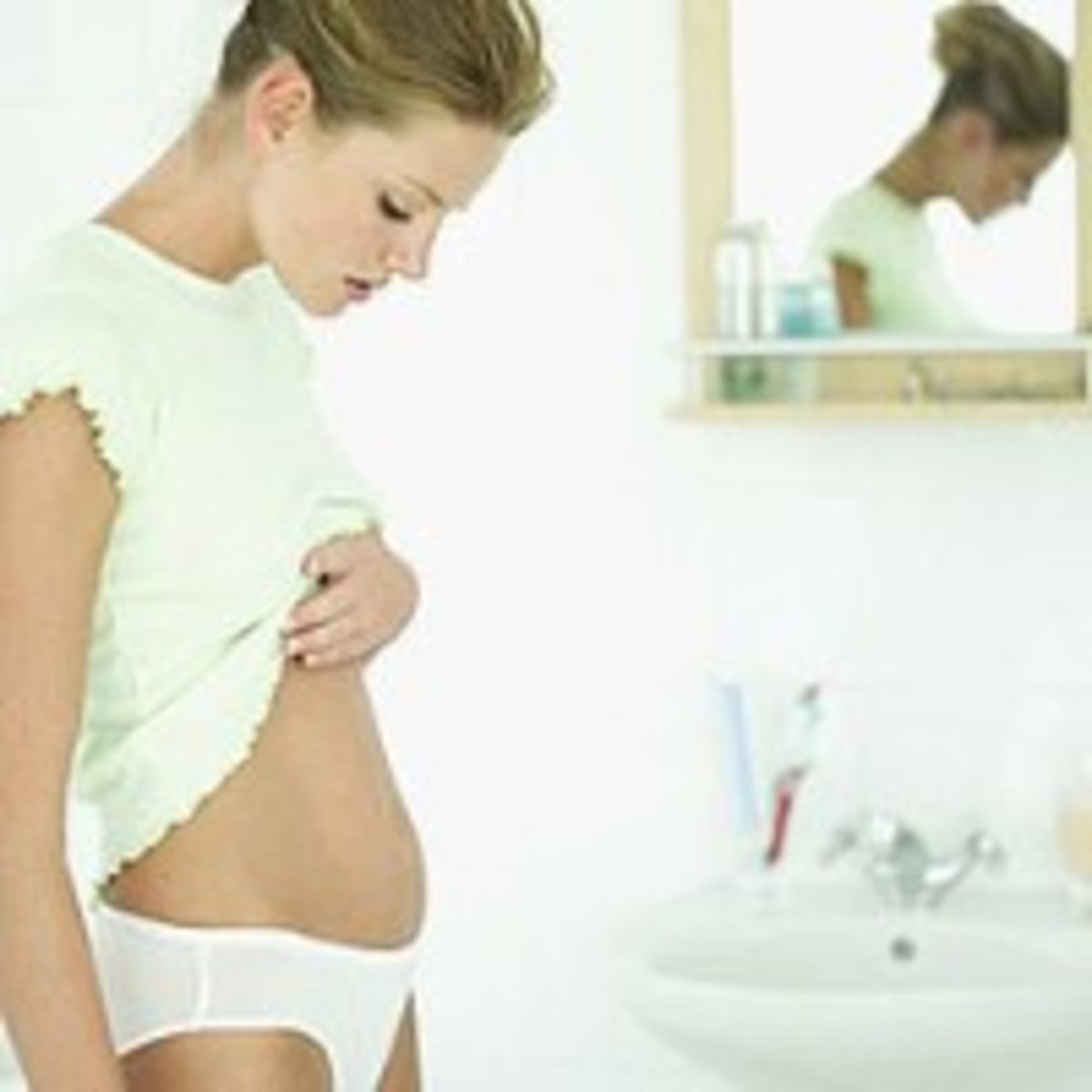 Why Do I Still Look Pregnant? The 411 On Diastasis Recti (aka 