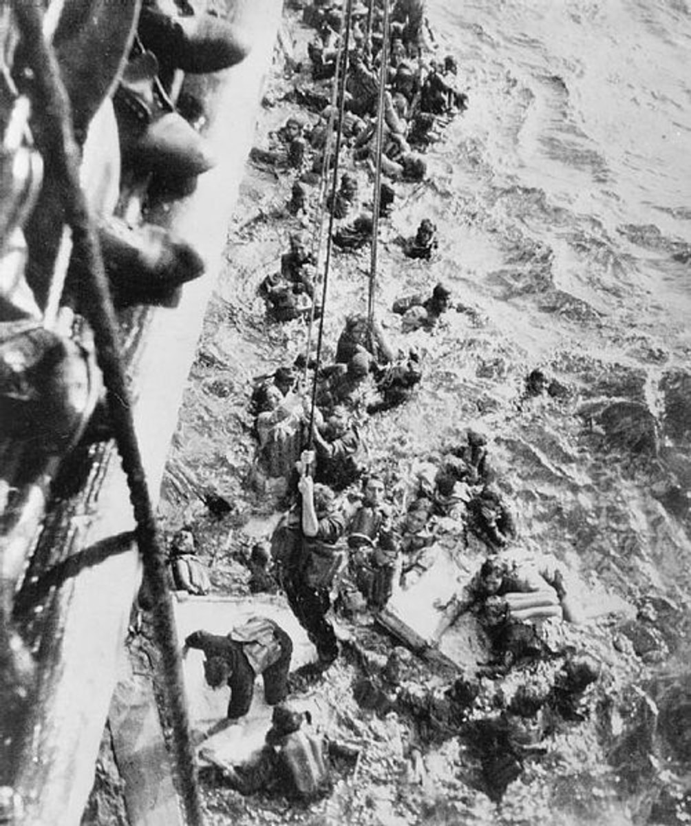 WWII: Survivors from the Bismarck are pulled aboard HMS Dorsetshire on 27 May 1941.