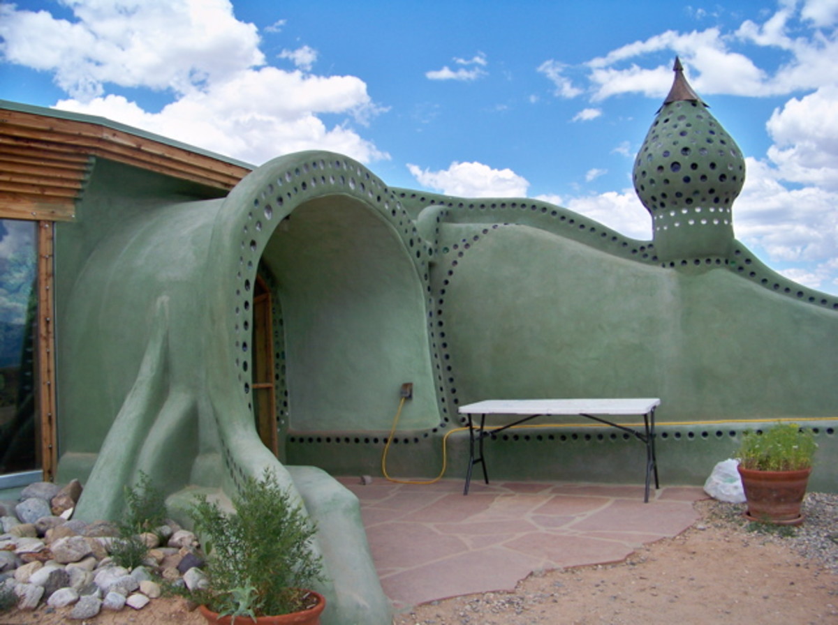 Entrance to a fully sustainable Earthship operating off the grid, located outside of Taos, New Mexico