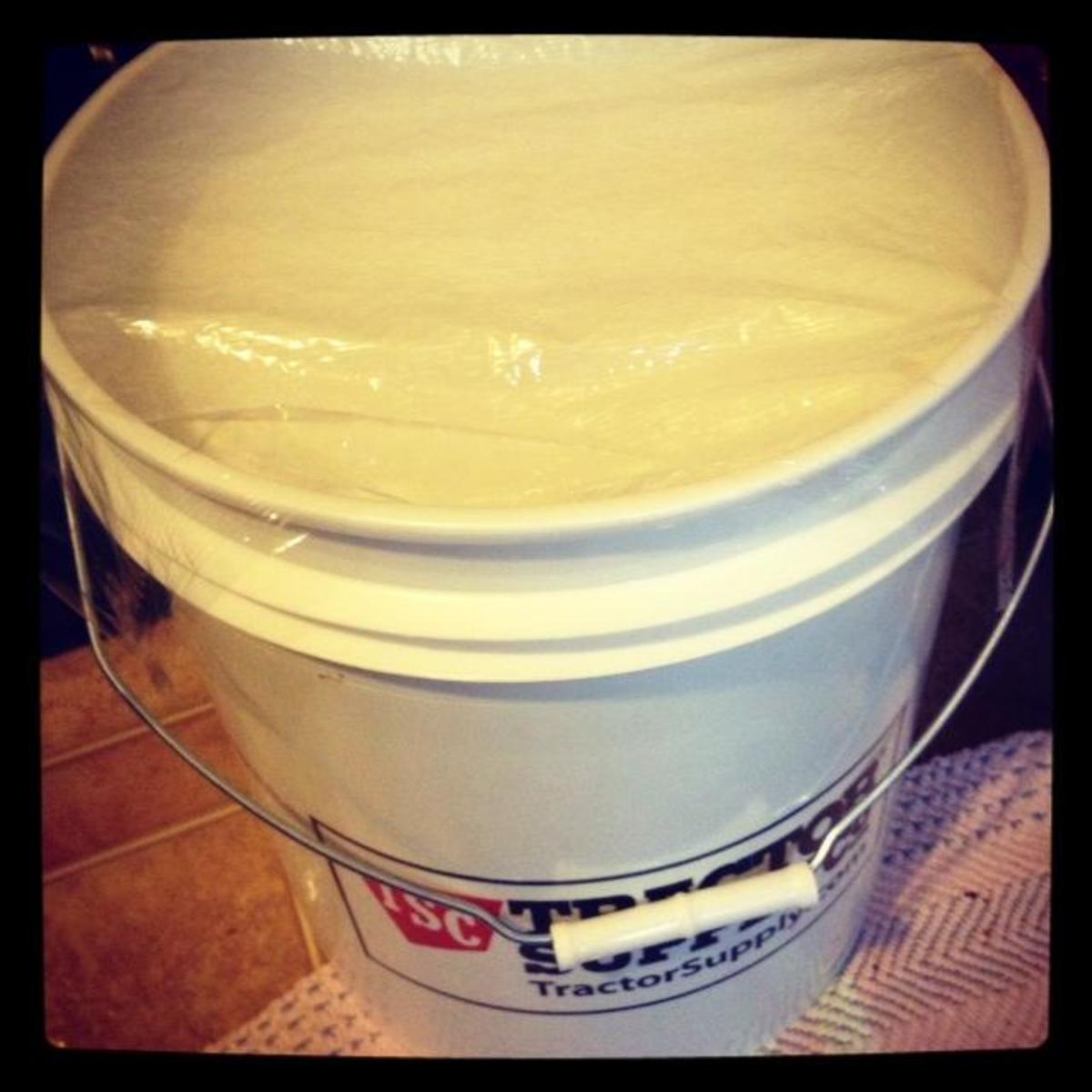 A completed 5-gallon bucket of homemade laundry soap.