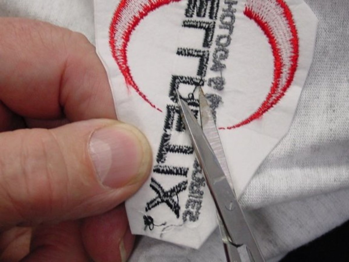 Removing stitches with scissors