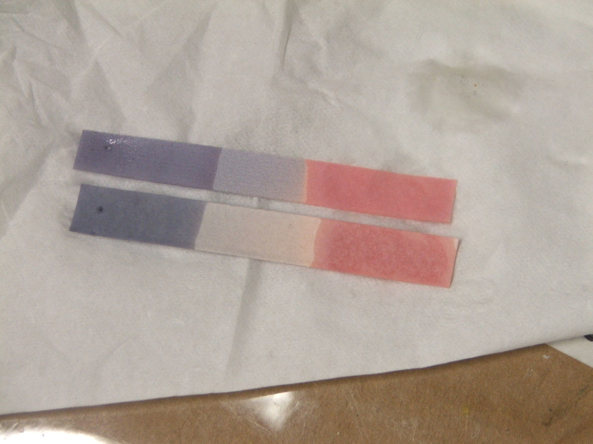 Litmus paper which was dippped in a base (left) and was also dipped in an acid (right).