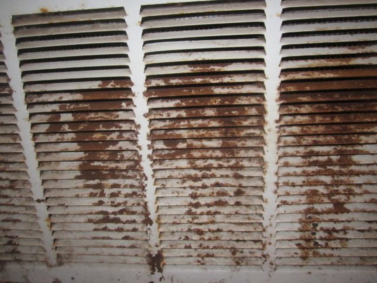 The rusted air grill before . . . . 