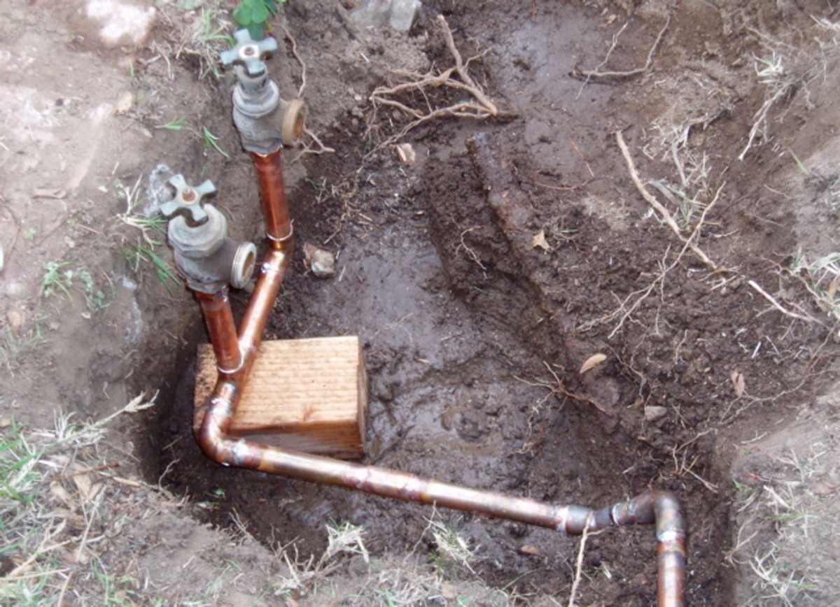 Elbows join different levels of piping. With this sprinkler pipe redesign, two copper pipes on different levels had to be soldered together with two elbows. Changing directions also requires soldering an elbow.