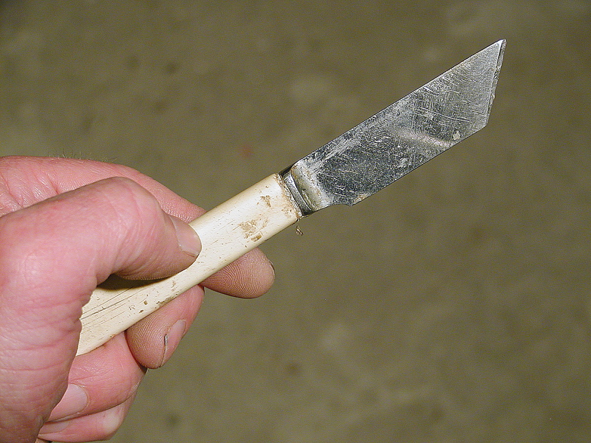 A sharpened dinner knife used for marking timber