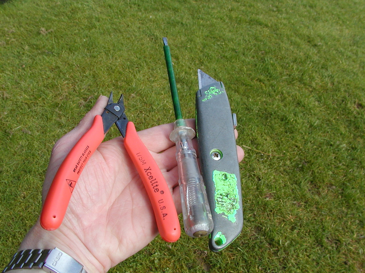 Snips, screwdriver and knife