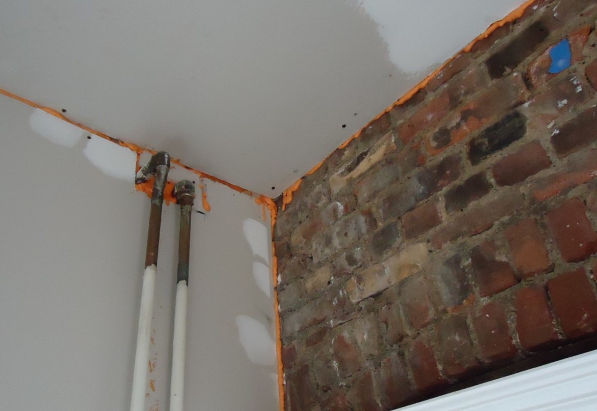 Fill gaps along the basement's walls and ceiling with a foam sealant.