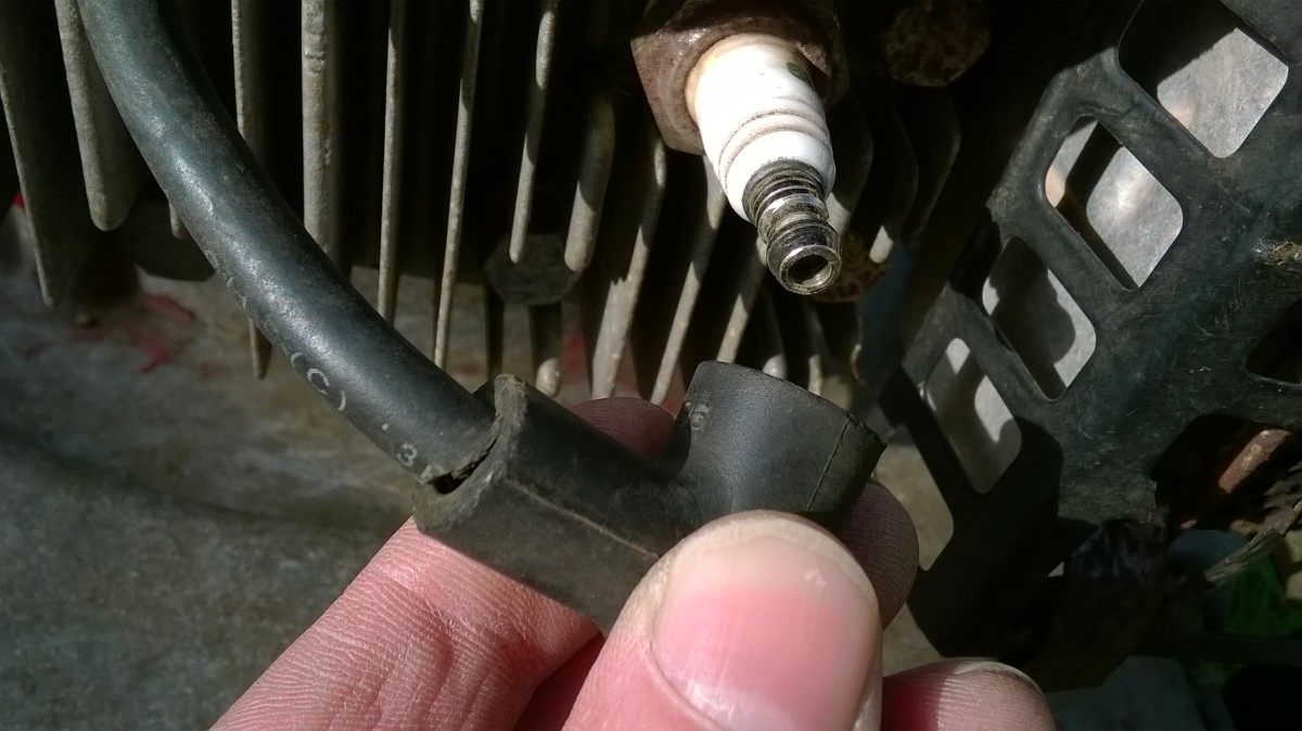 If you're trying to start the engine, check the spark connection. But if you need to clean under the deck or turn the blade, then remove the spark plug first.