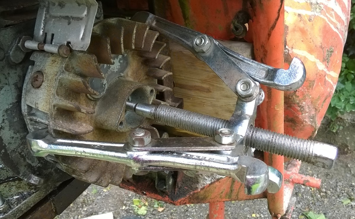 Ideally, remove a flywheel with pullers.