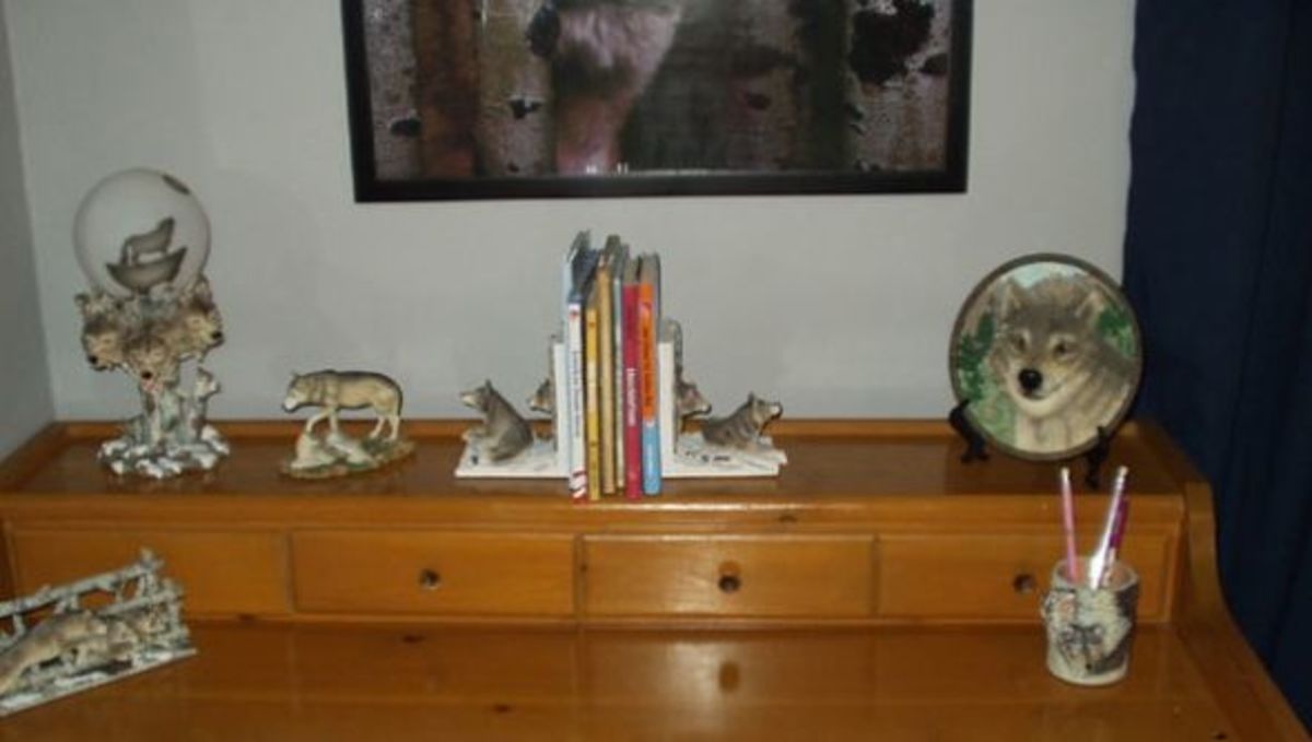 We bought this cool desk at a used furniture store, and added wolf bookends, figurines, and other accessories that we found at various places.