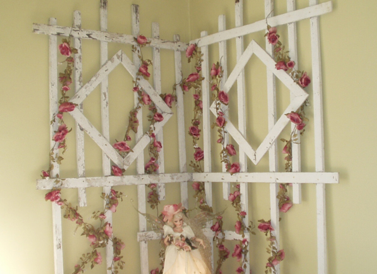 The rose trellis from the front porch, decorated with silk rose garlands.