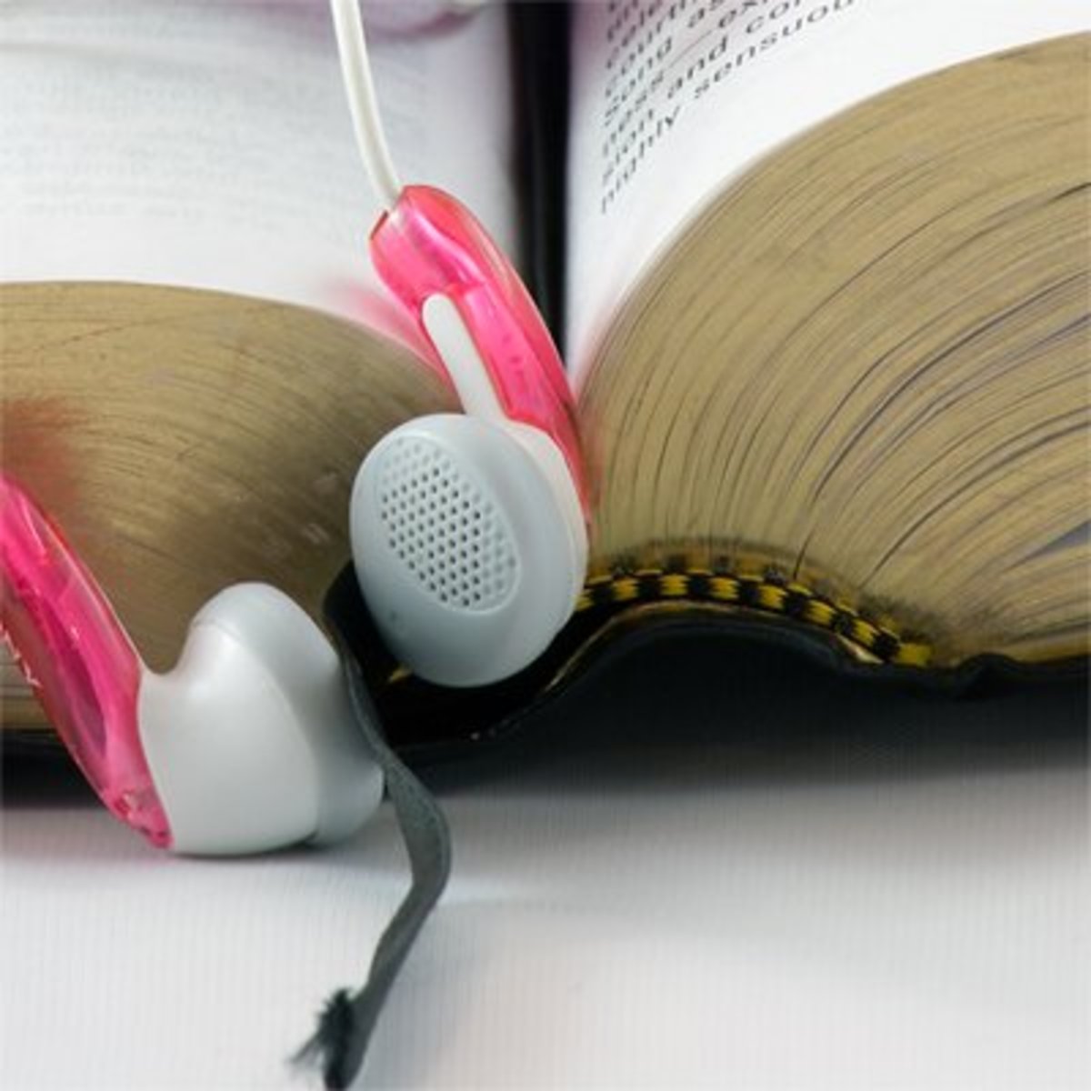 Book and earbuds