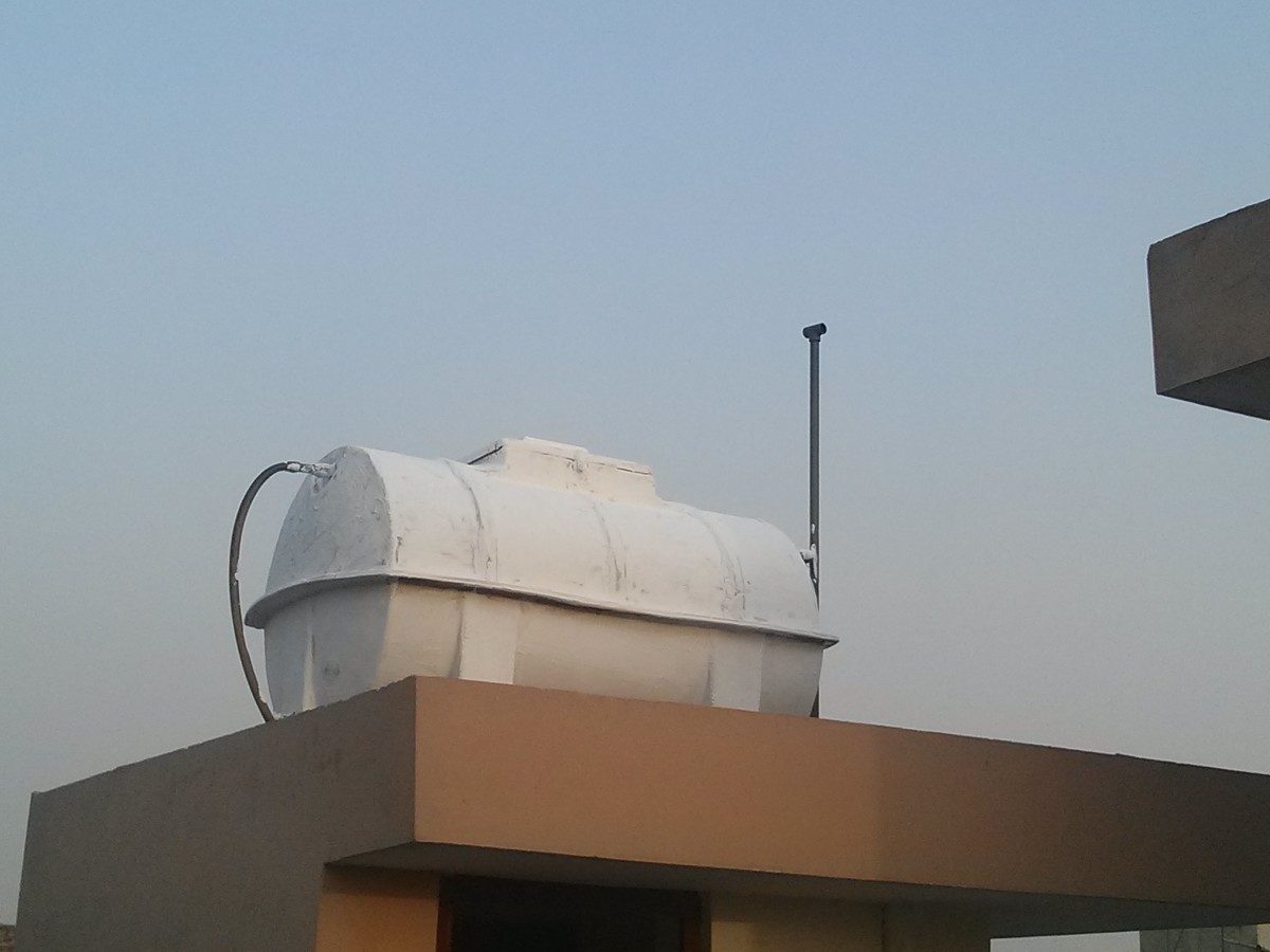 water tank painted with calcium carbonate