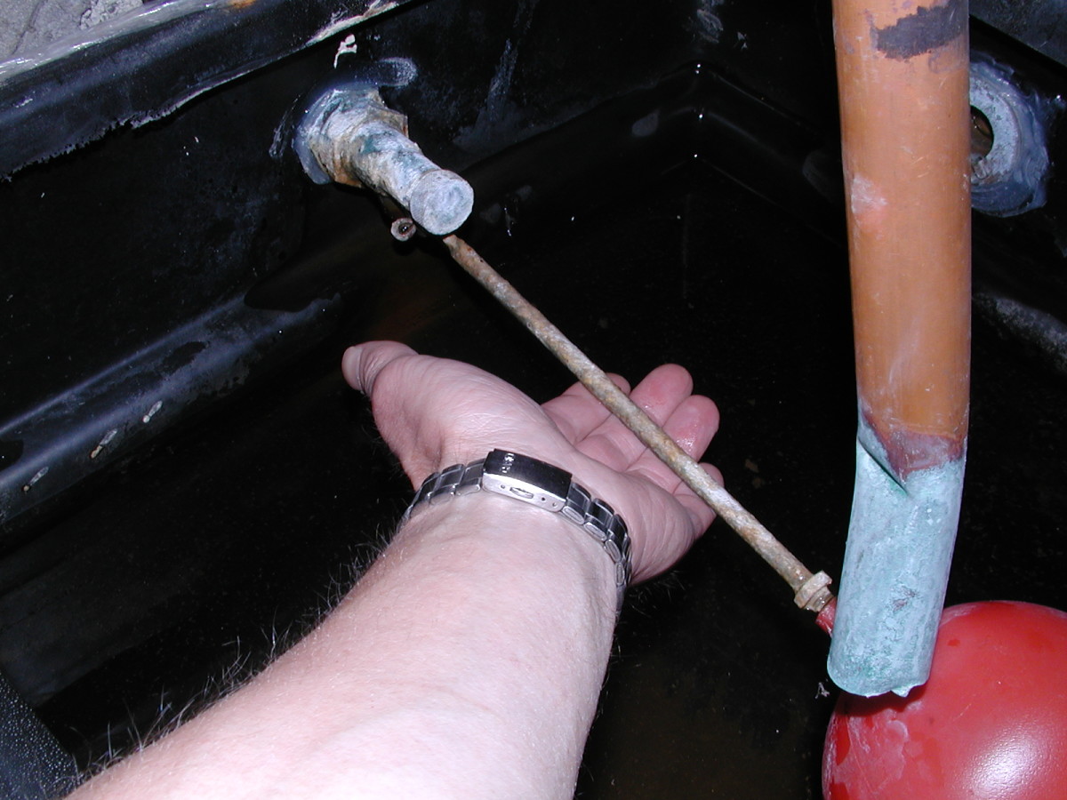 Pull upwards on the float arm to check whether the water flow shuts off ok