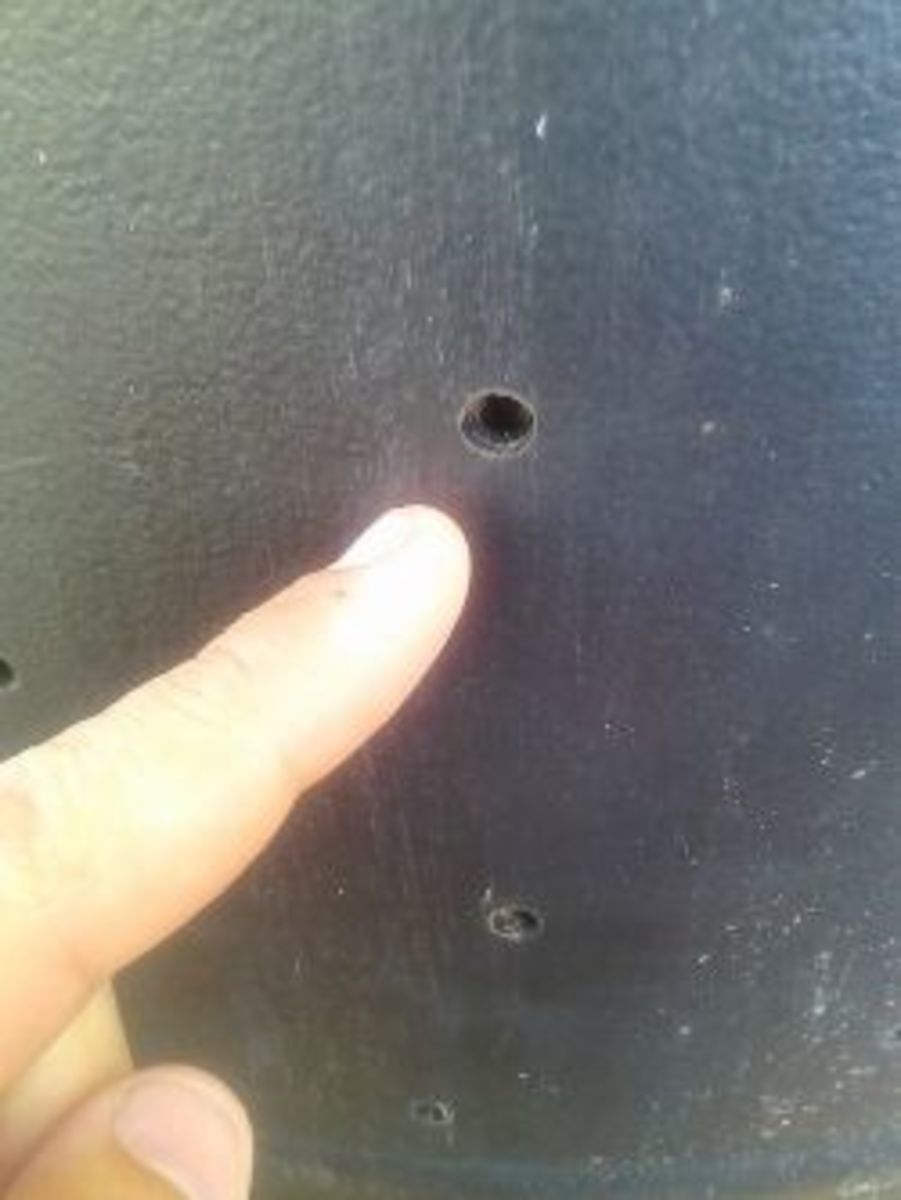 Here's a close-up of one of the many holes I drilled into my compost bin.