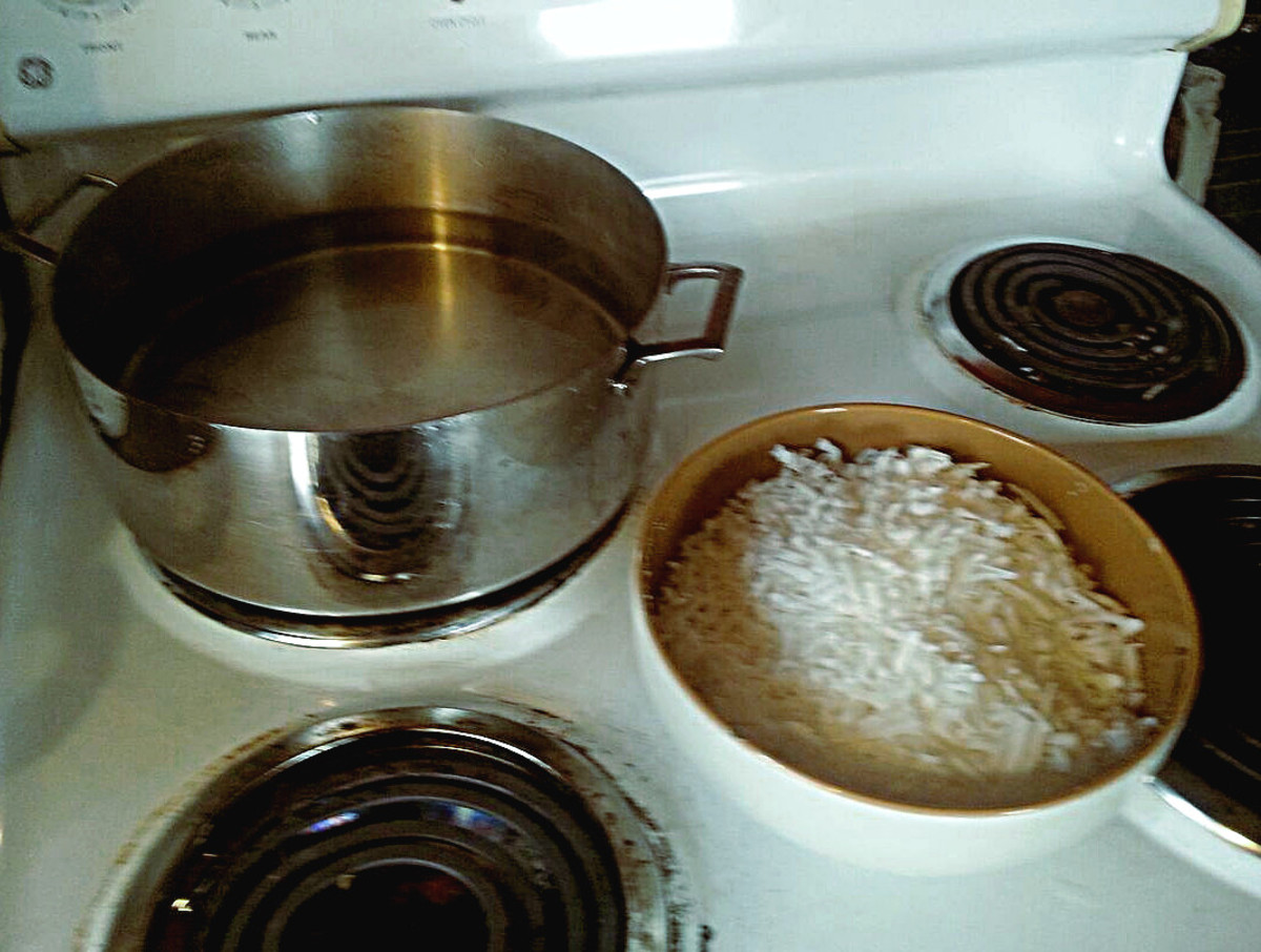 Pan of three quarts water and bowl of 12 ounces grated soap