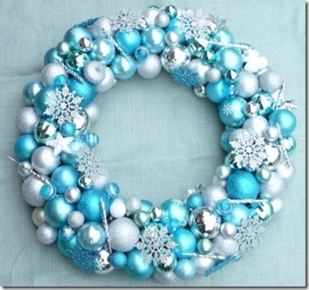 I'll show you how to make a Christmas ball ornament wreath like this. It's not as hard as you think!