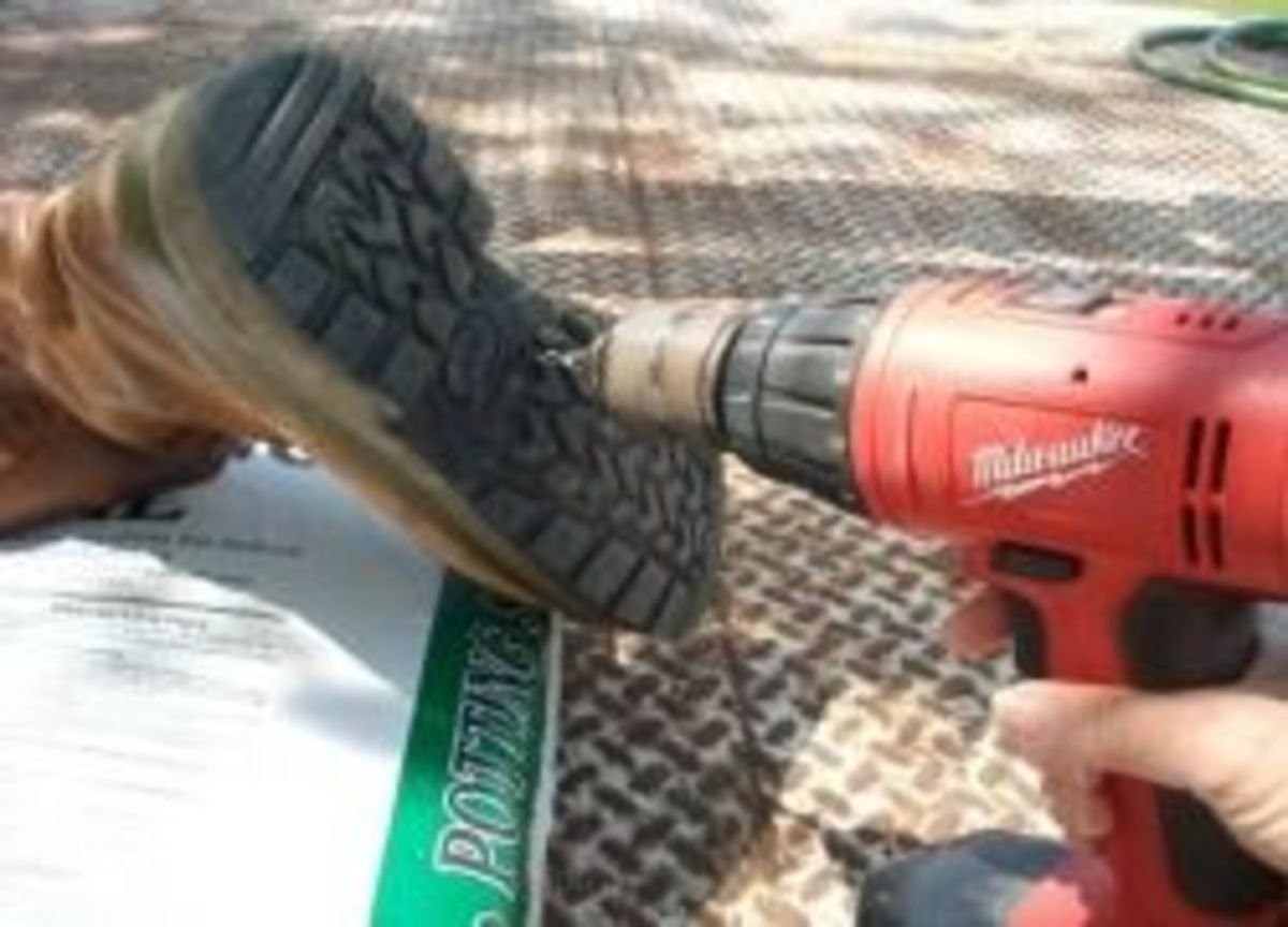 Drilling drainage holes in the bottom of old boots 