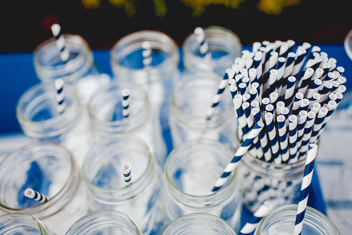 Blue and white single-use paper straws