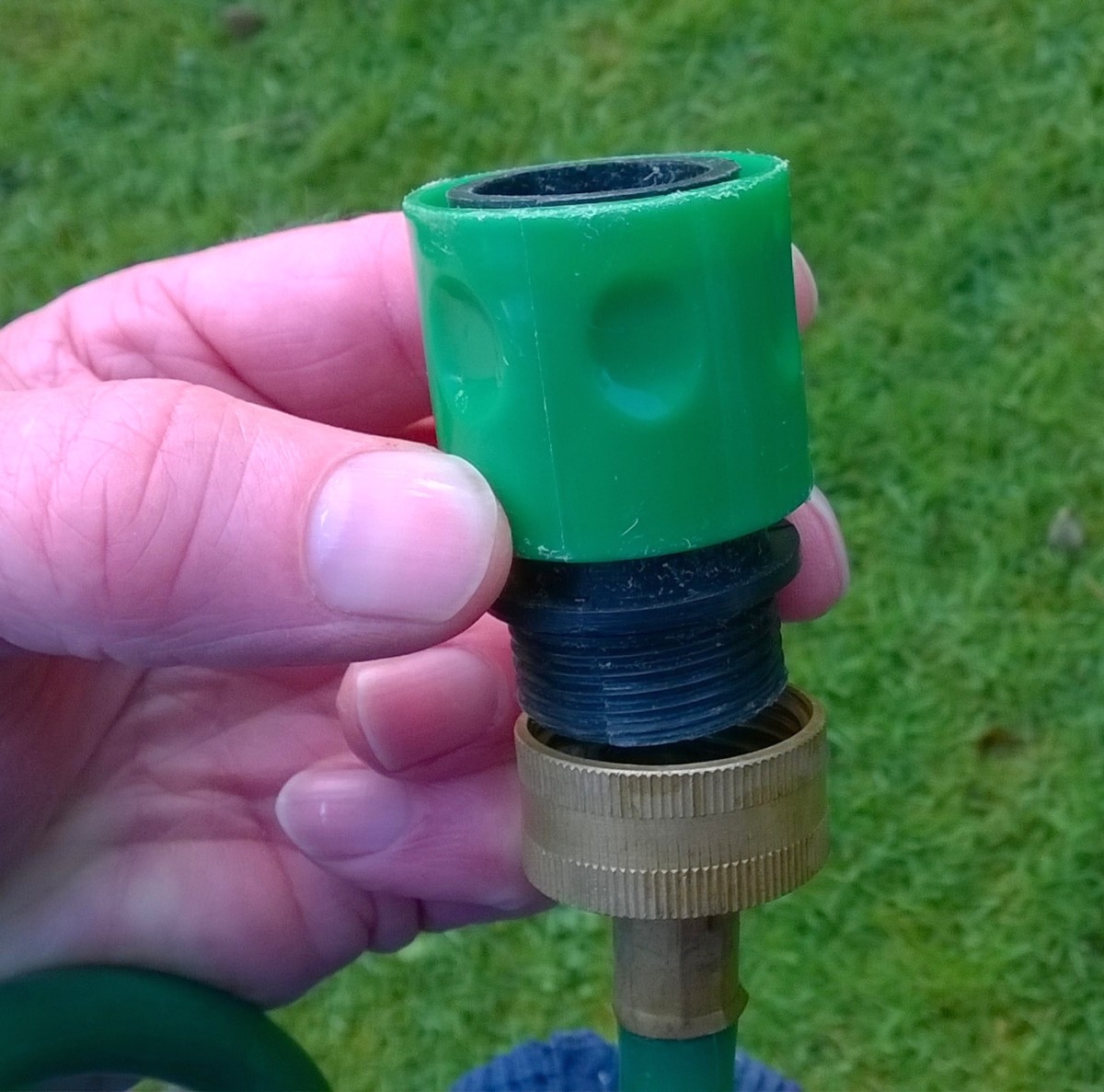 A flat hose and spiral hose adapter for connecting these type of hoses to a push fit tap connector.