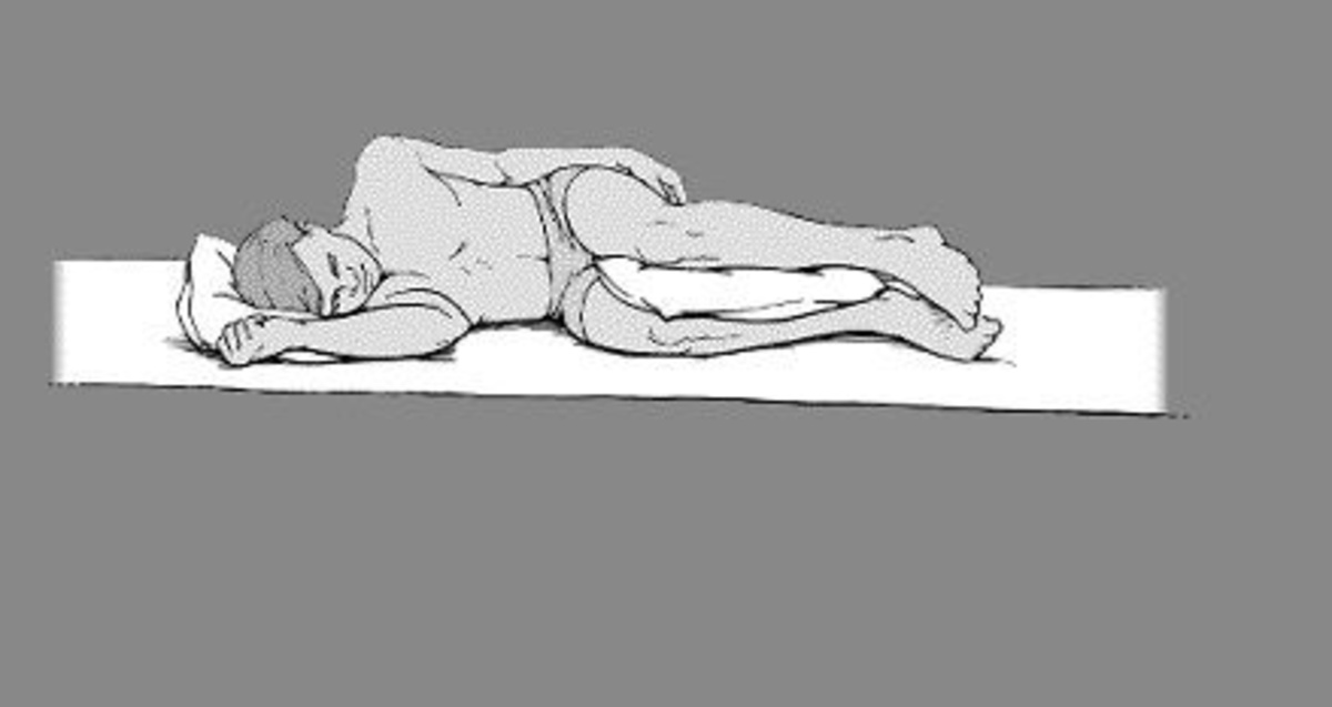 Place a pillow under the head and neck, and one between the knees.