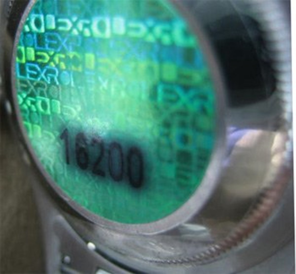 An official Rolex hologram on the back of a Datejust.