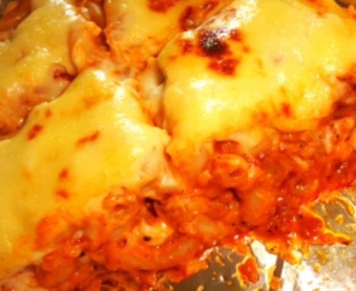 The baked macaroni covered in cheese.