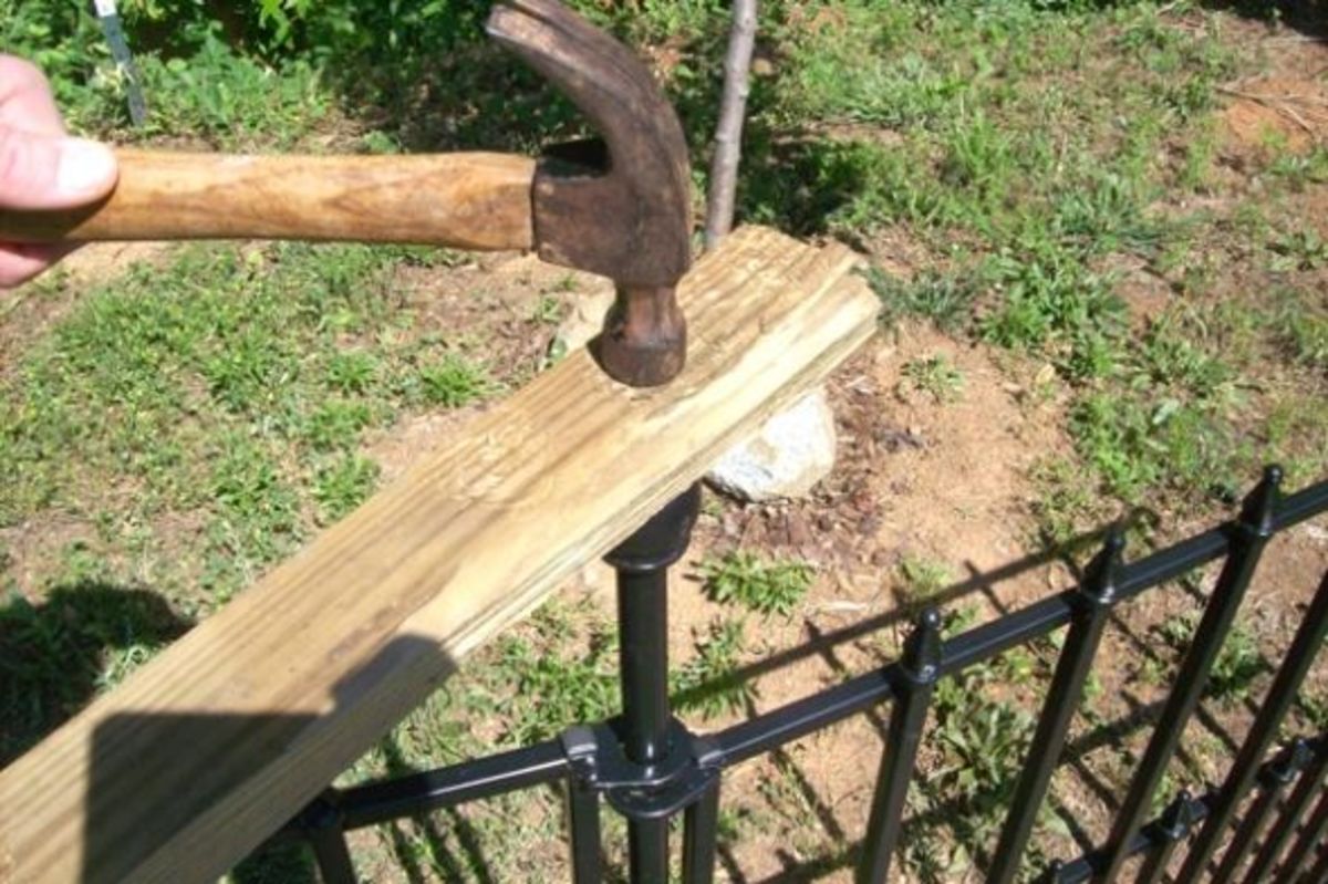 Knock the post in with a 2x4 to avoid damage. 