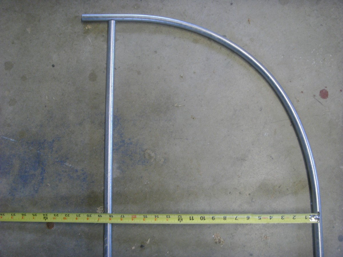 Measuring the radius of the concentric bend; it is very close to the 18" we wanted.
