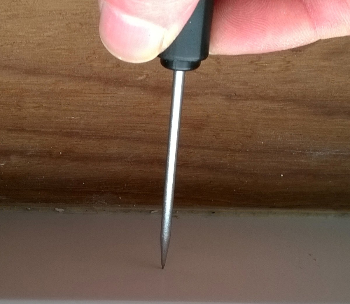 An awl is used for making holes prior to driving screws or drilling.