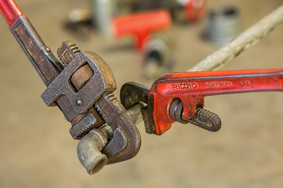 Pipe wrenches or "Stilsons"