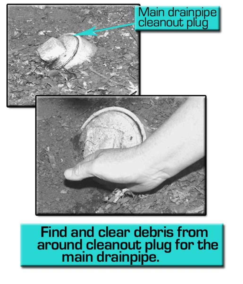 Remove debris and dirt from around main drainpipe cleanout plug.