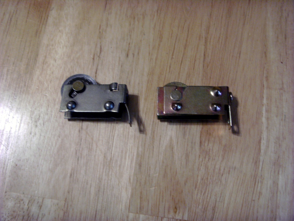 Old and new roller assemblies.  They are virtually identical, as is necessary.