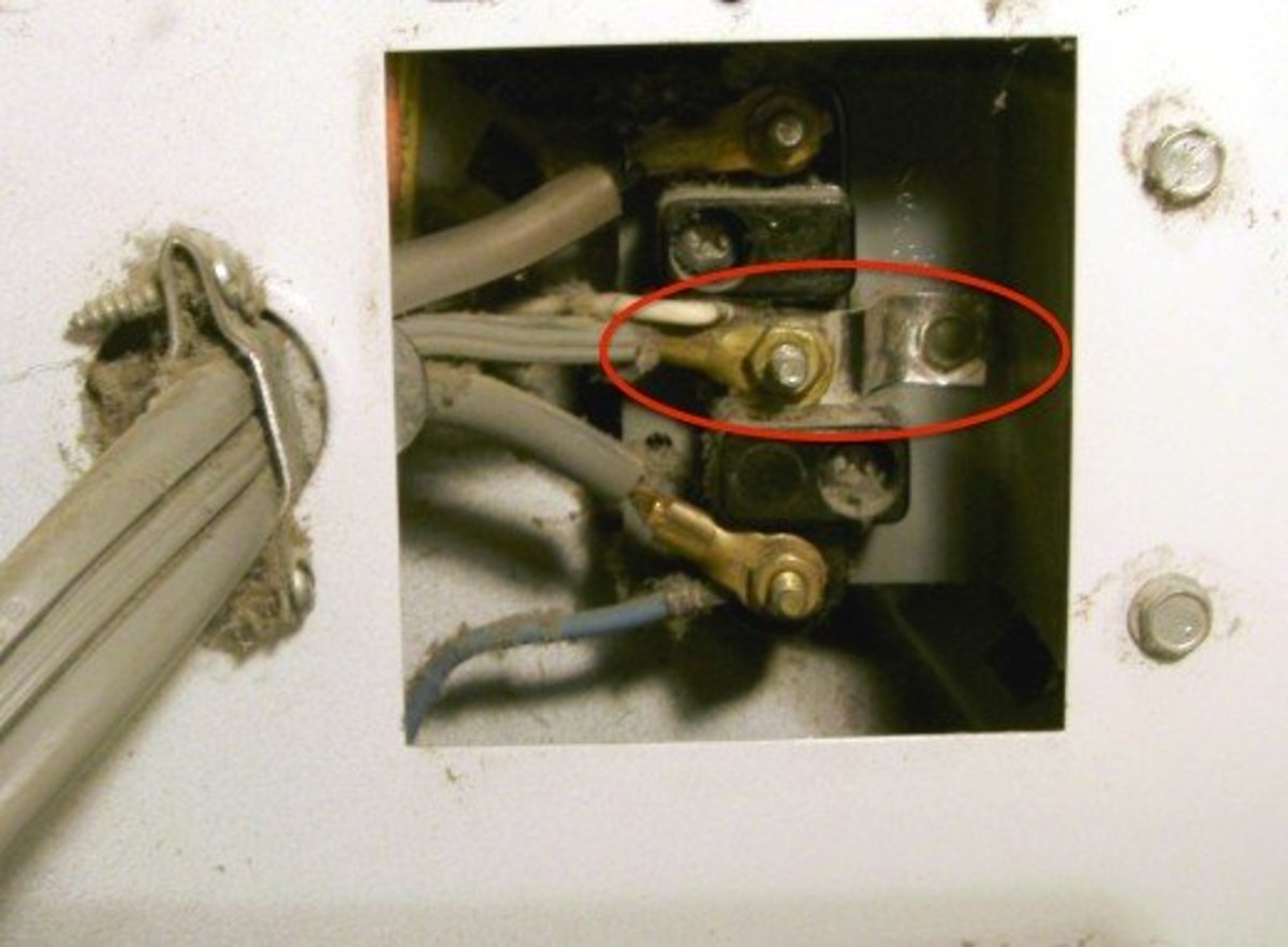 What the three-wire connection will look like, including a metal ground strap (circled) between the dryer frame and the white wire.  You can use a #10 wire instead of a strap.