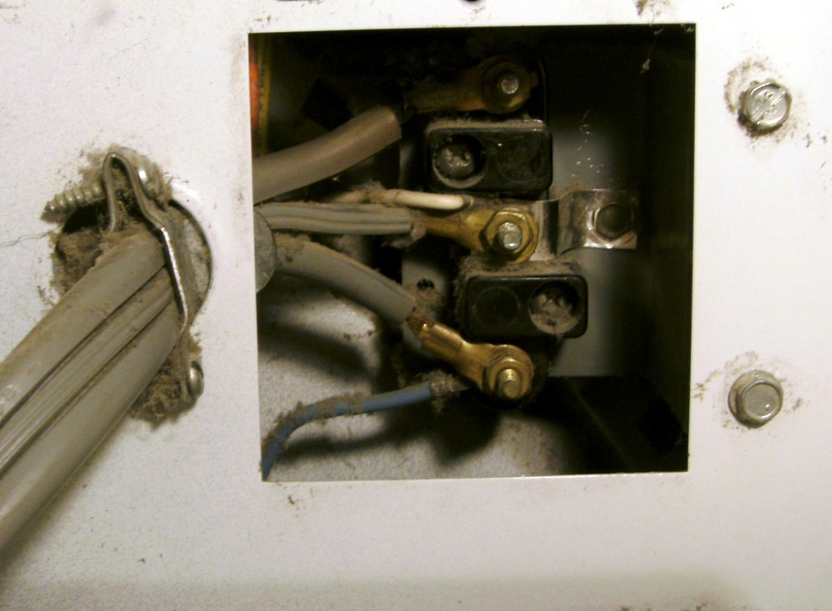 Three prong cord still connected.  Note the metal piece that goes from the white wire to the frame of the dryer.