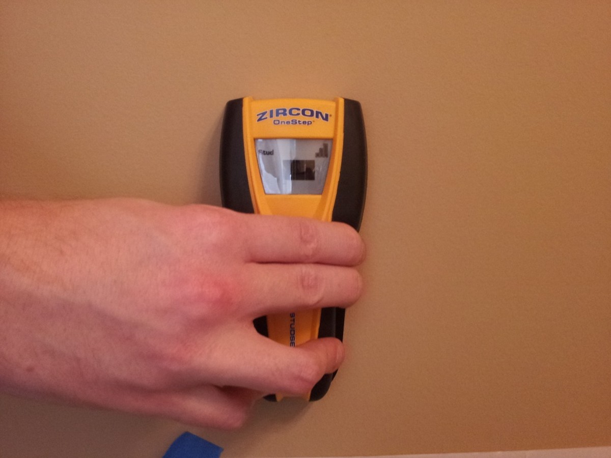 Use a stud finder to mark the location of any studs on the wall.