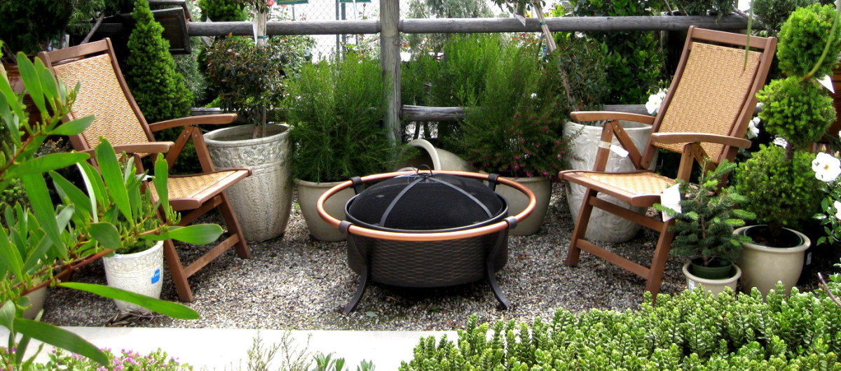 Your garden can include a small space for sitting and enjoying the warmth from a safely screened fire pit.