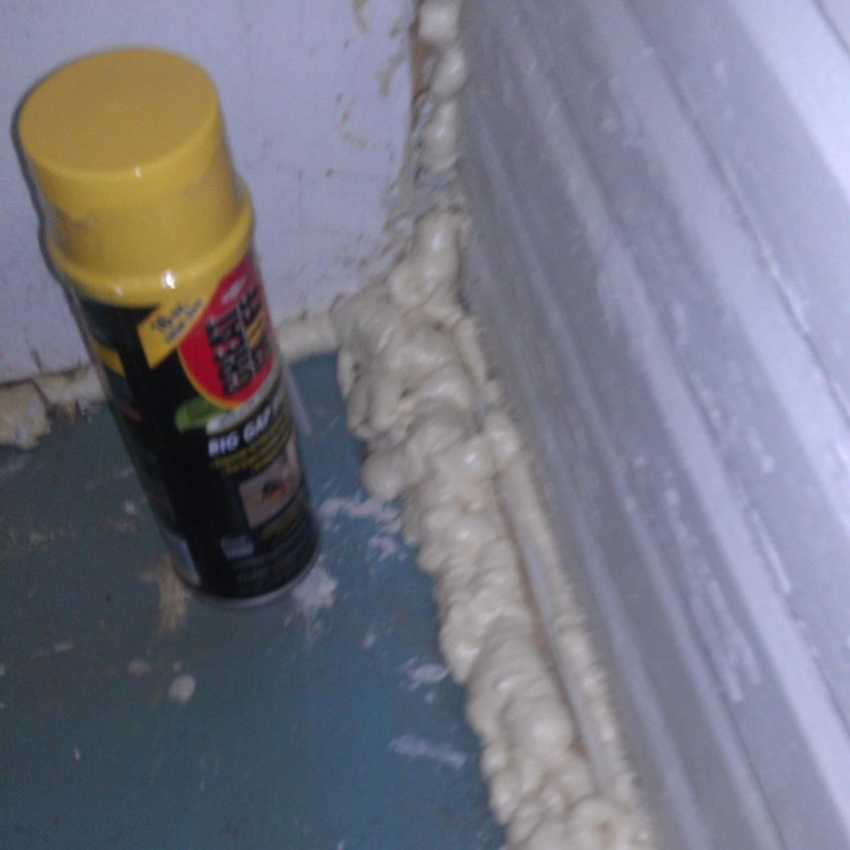While messier than caulk, you can weatherize and seal expanding spray foam.