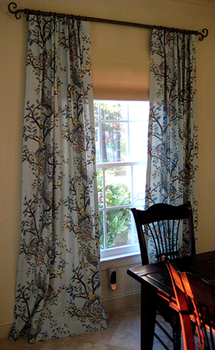 Example of curtains that exceed the width and height of a window.