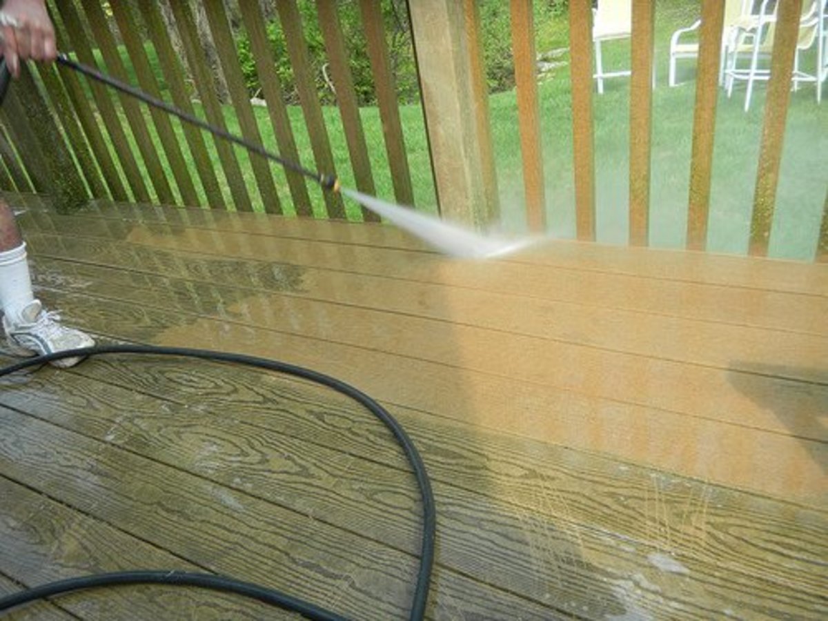 Pressure washing your deck is a good idea to remove deep set stains and mildew