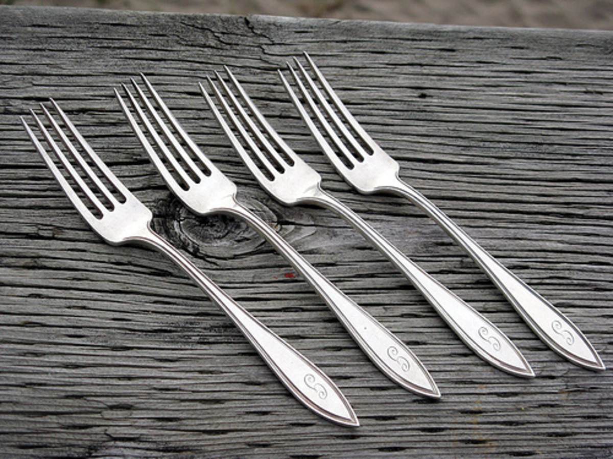 Vintage silverware can be crafted into elegant curtain holdbacks.