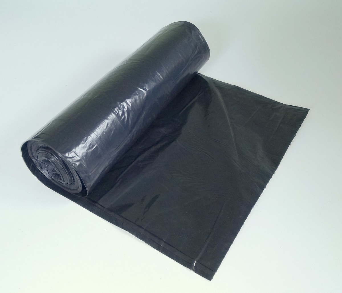 You can use a refuse sack (trash bag) for covering the ground or floor.