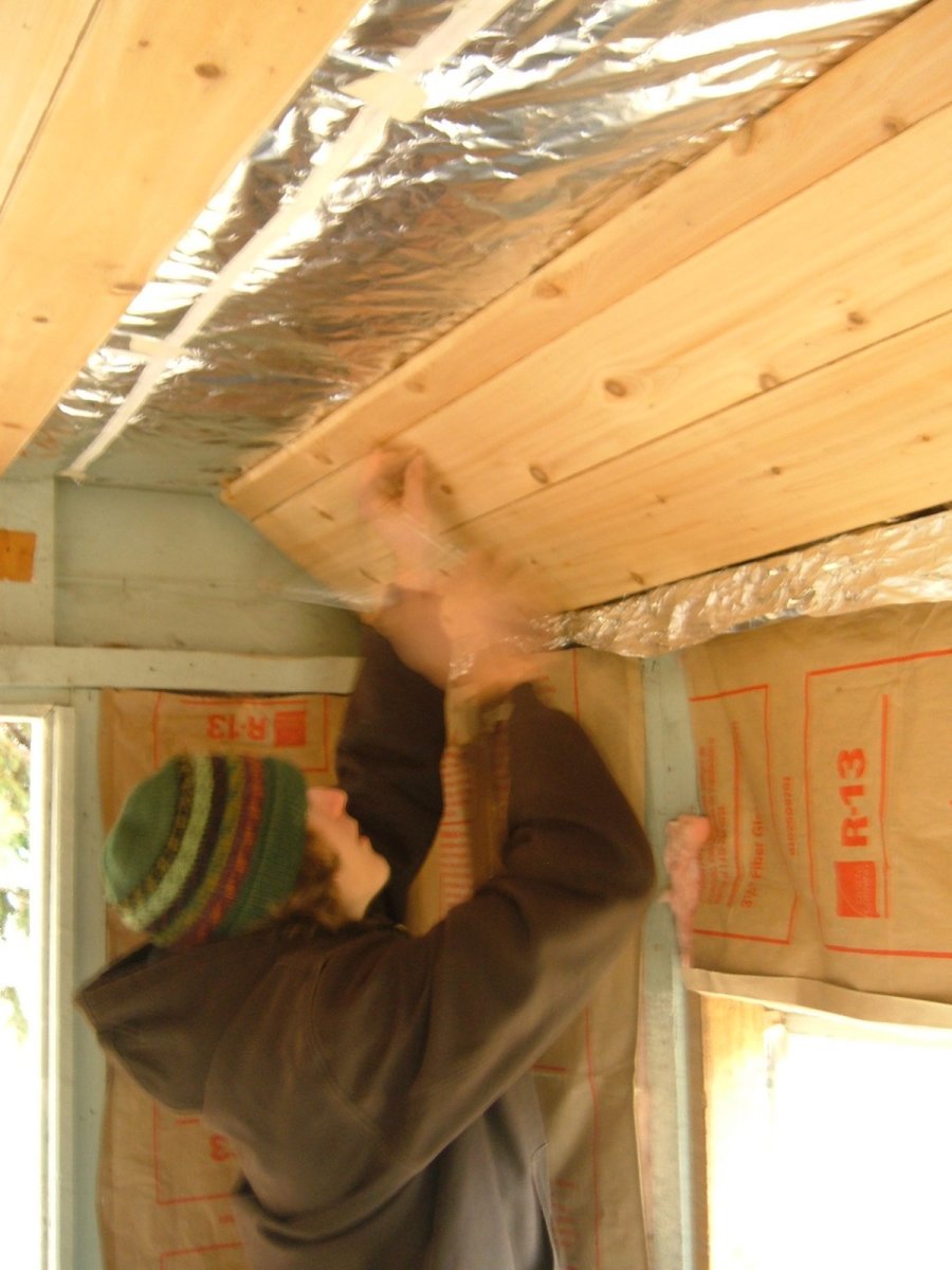 Installing the Ship-Lap Cedar Wall Boards: Nice job, Dan (my younger son).
