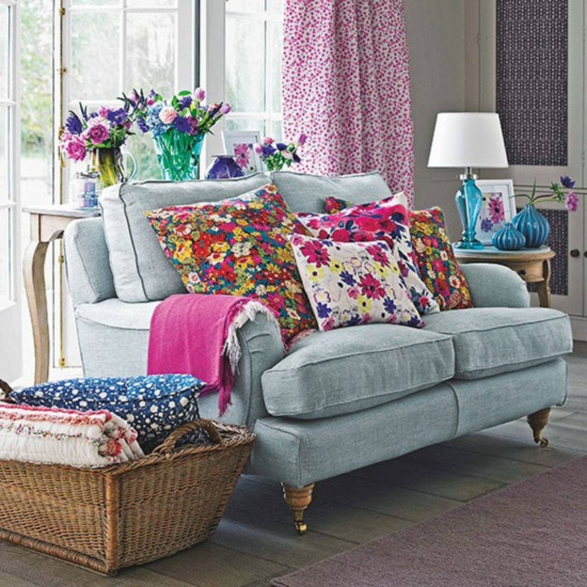 The floral theme ties the colored items in the room together.