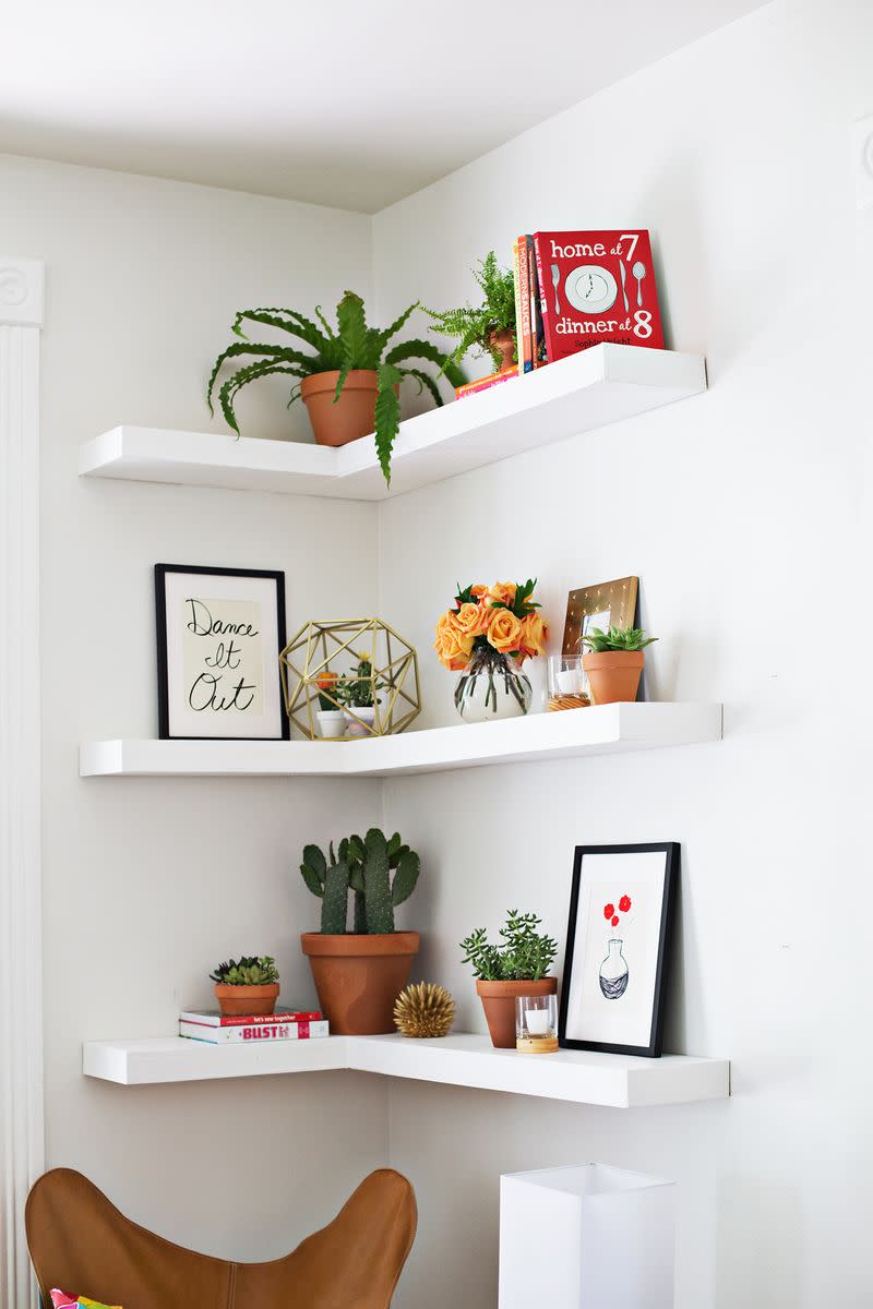 This set of floating shelves draw the eye up while adding room for knick knacks in otherwise wasted corner space.